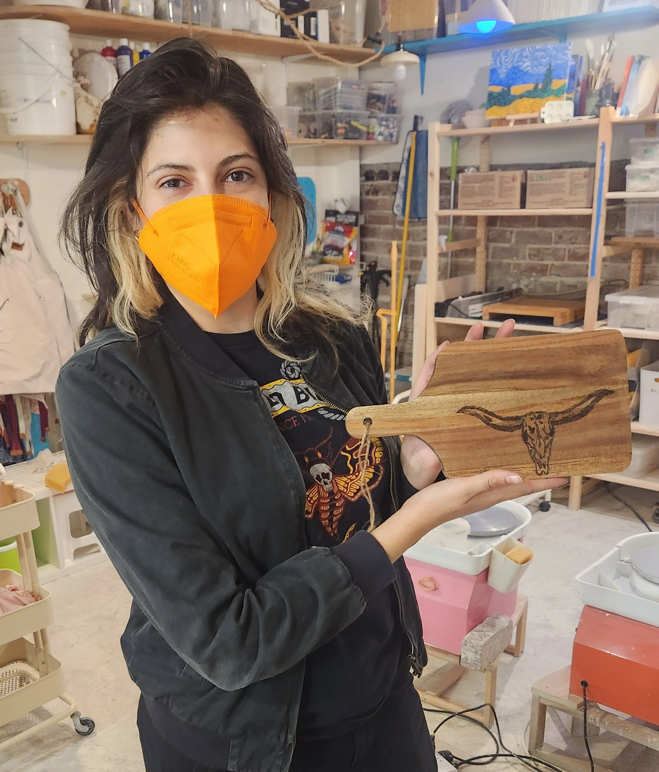 A beginner wood-burning or pyrography class where students make their own charcuterie boards!