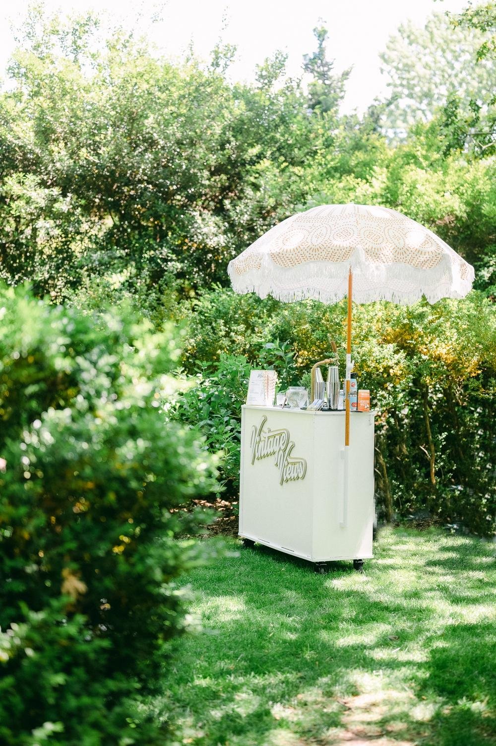 vintage-views-bar-with-white-umbrellas-at-micro-wedding-in-dc.jpg.jpg