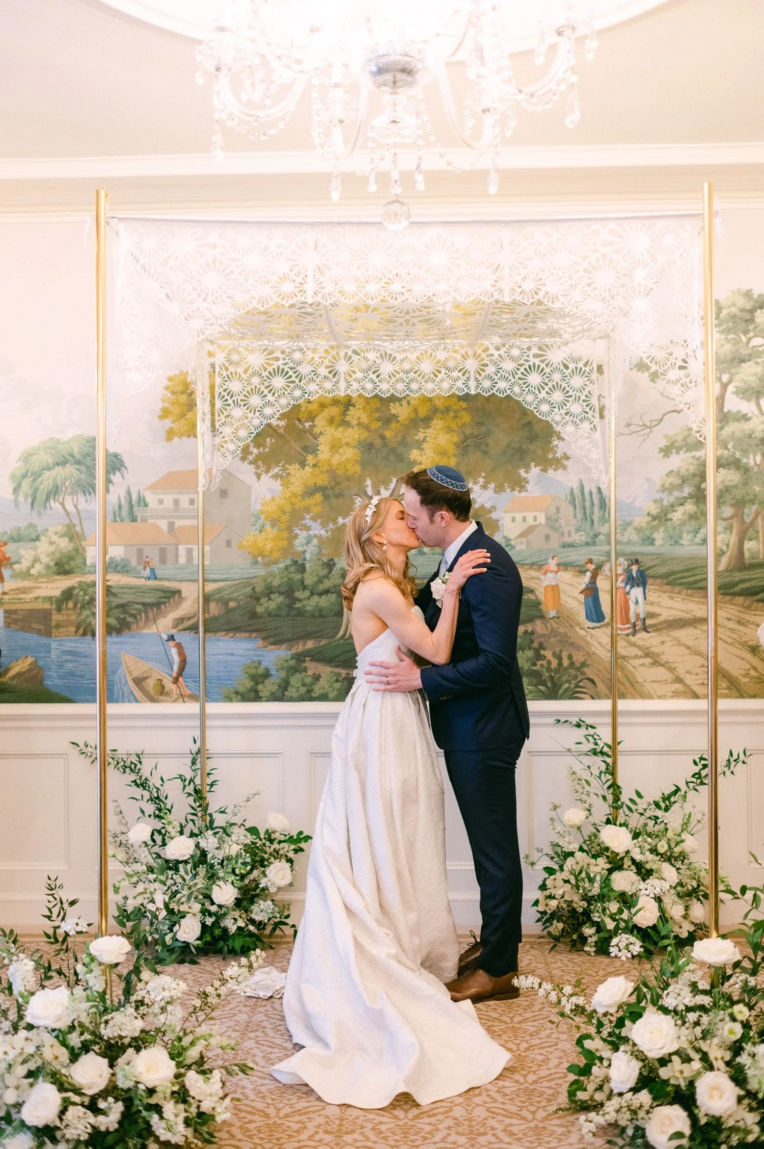 couple-kisses-under-chuppah-at-washington-dc-micro-jewish-wedding-.jpg.jpg