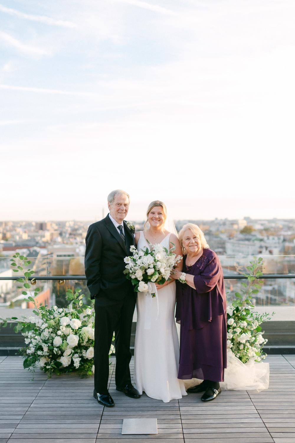 bride-smiles-with-grandparents-on-the-rooftop-of-the-line-hotel.jpg.jpg