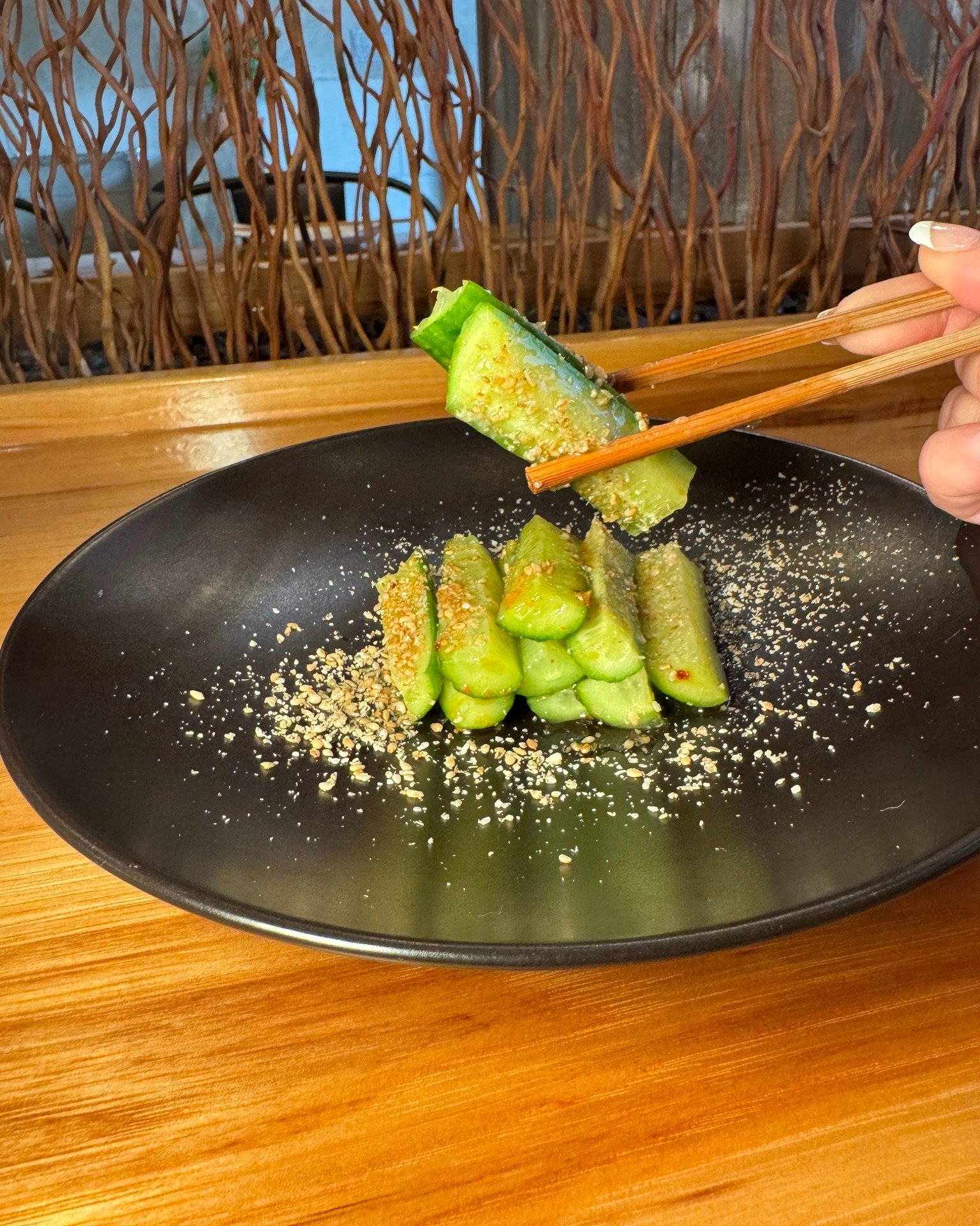 A refreshing start to your meal at Japanese Ramen Gachi - Sesame Cucumbers 🥒