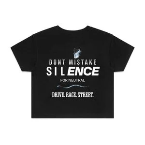 Don't Mistake Silence for Neutral black crop top featuring white typography and the Drive Race Street slogan.