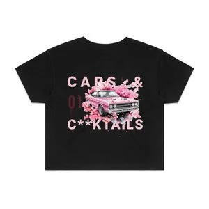 Cars and Cocktails black cropped streetwear t-shirt with a vintage pink muscle car graphic and white typography.