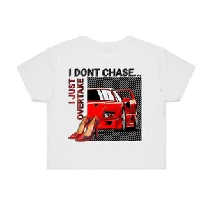 White graphic t-shirt by DRS Apparel featuring a red Ferrari F40 and red high heels with the text 'I Don't Chase... I Just Overtake' in a modern streetwear style.