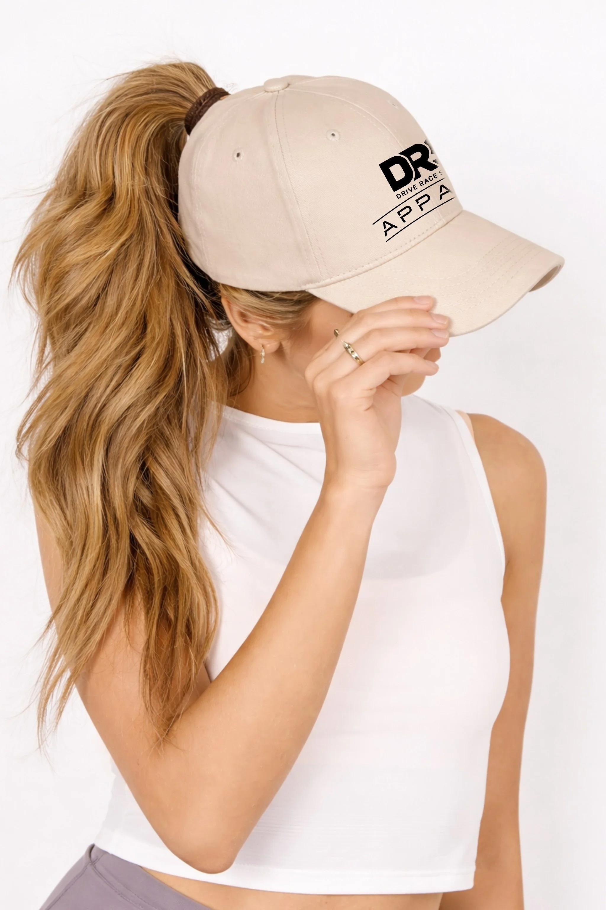 Automotive accessories for women including stickers and car girl essentials such a high ponytail caps with a magnetic back closure, and miniature wheel earrings.
