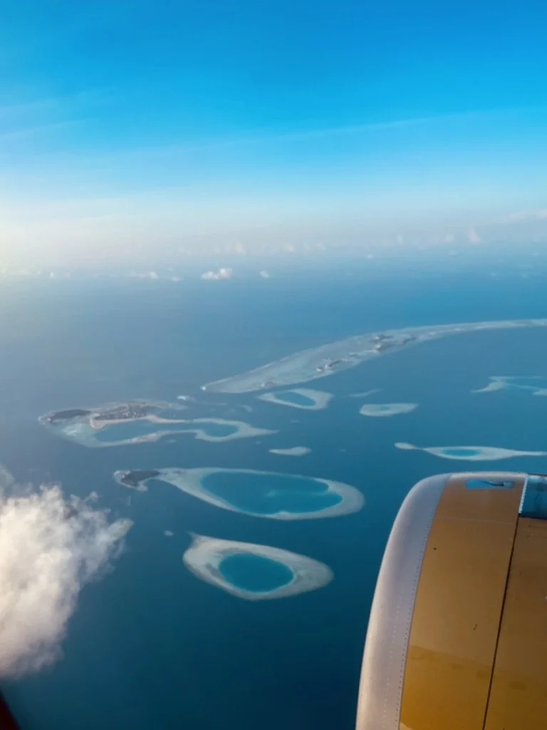 View from airplane over The Maldives