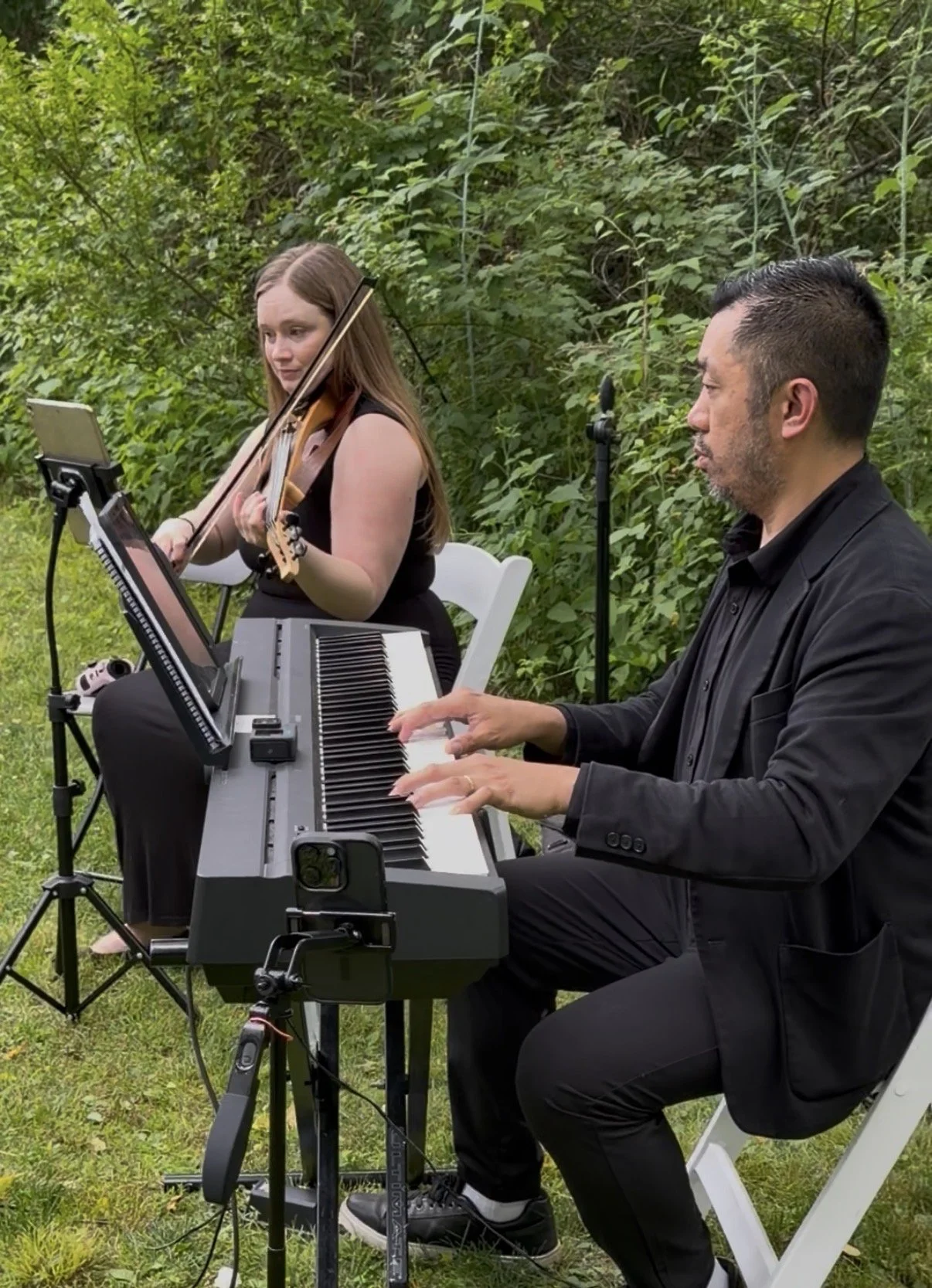 Violinist Julie Myers and Pianist Sanford Guerrero performs a duet at Waterloo Gardens in New Jersey.