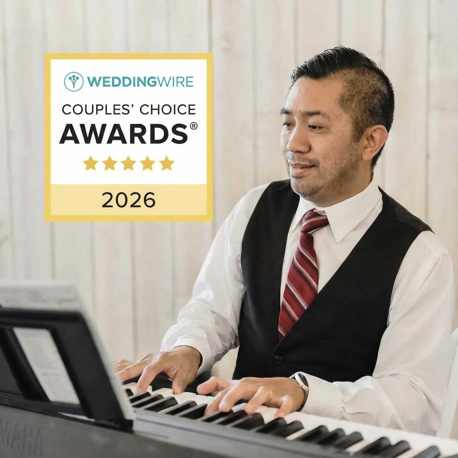 Man playing piano in an office setting, wearing a White shirt, vest, and striped tie, with a certificate from WeddingWire Couples' Choice Awards 2026 displayed in the background.