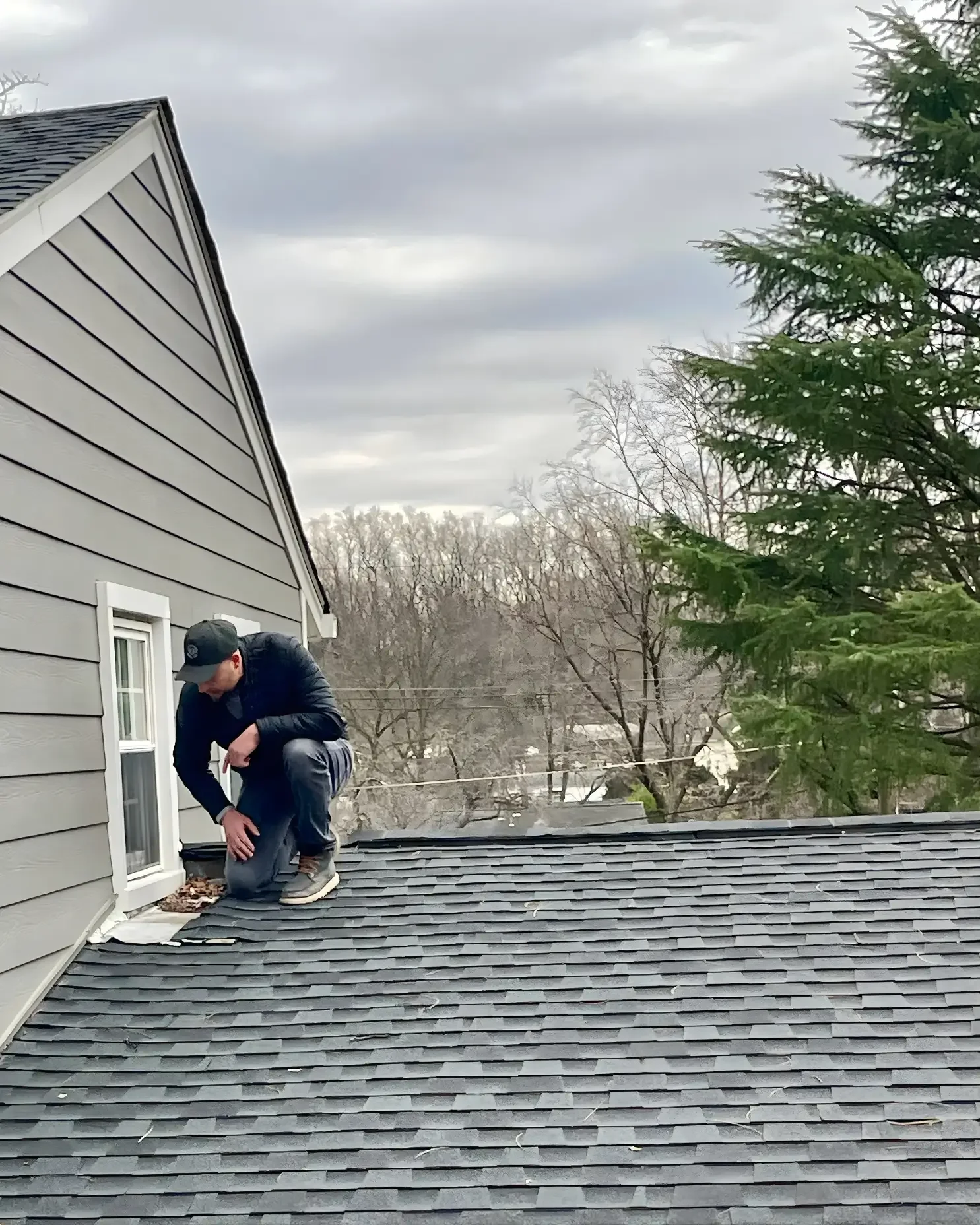 DA'Roofers inspecting roof for roof inspection estimation services