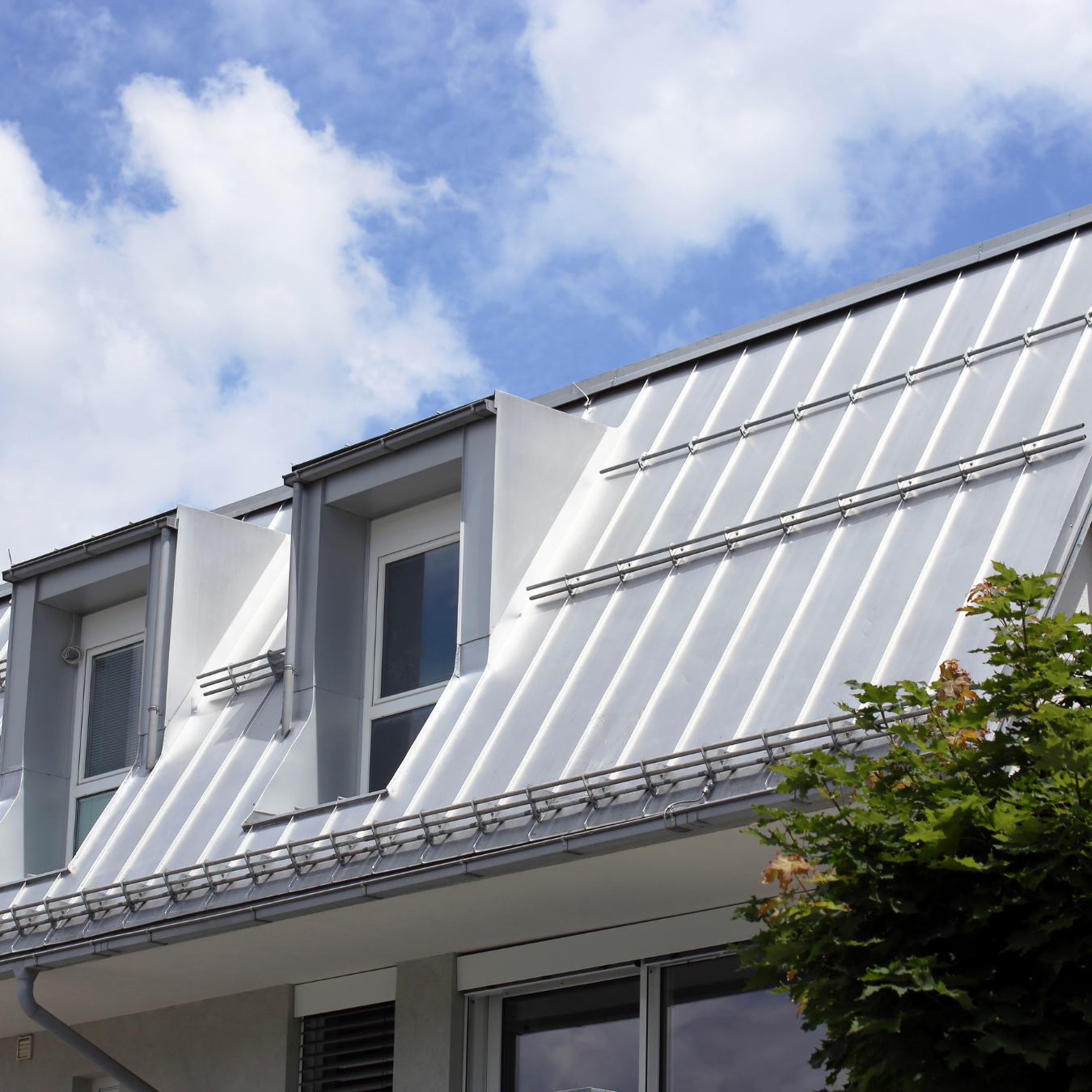 Energy-efficient metal roof reflecting sunlight