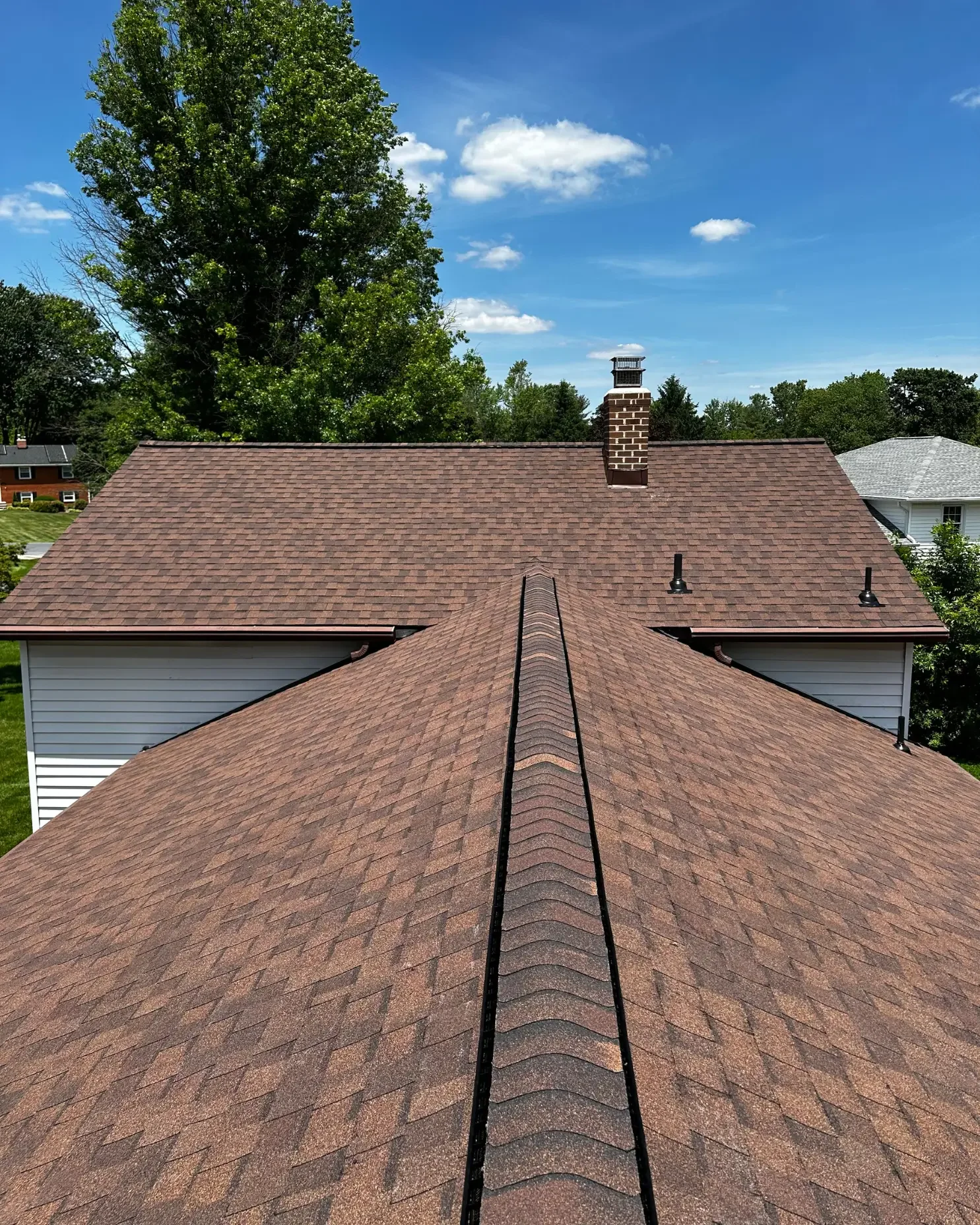 Newly installed roof in a house by DA'Roofers in Maryland