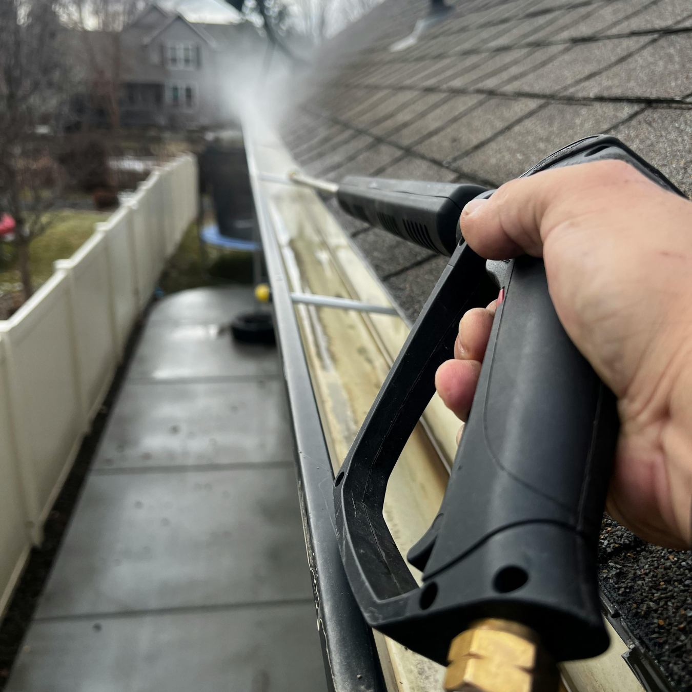 Professional gutter cleaning service in action