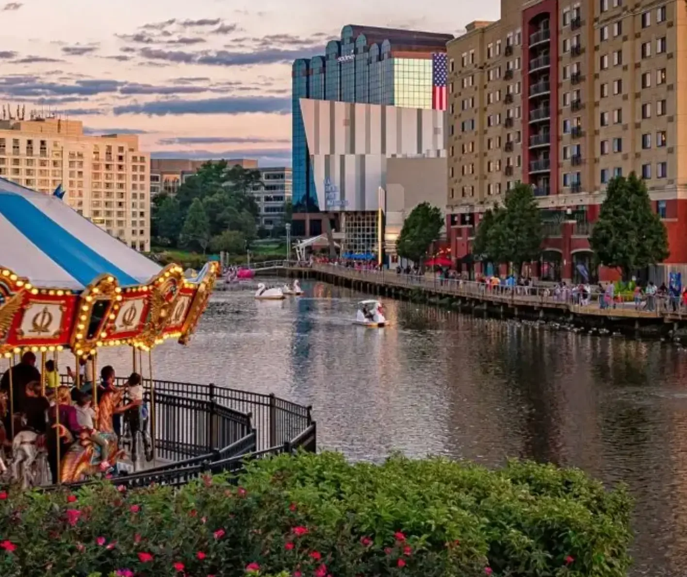A carousel with a river side view in the Rio