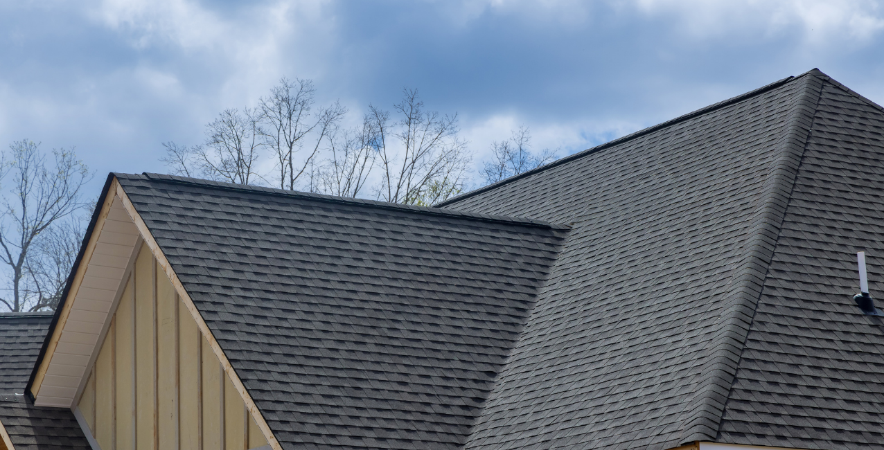 Finished DMV residential asphalt shingle roof highlighting expert installation and durable materials.