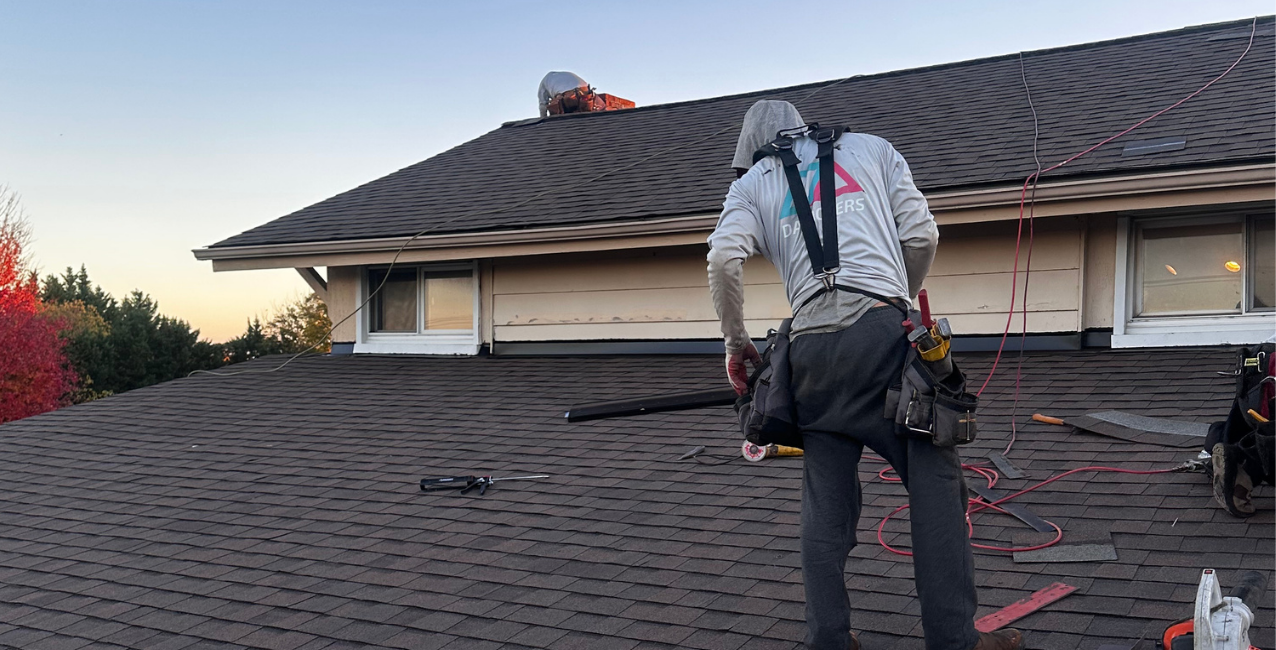 Da' roofers working on a DMV roof project