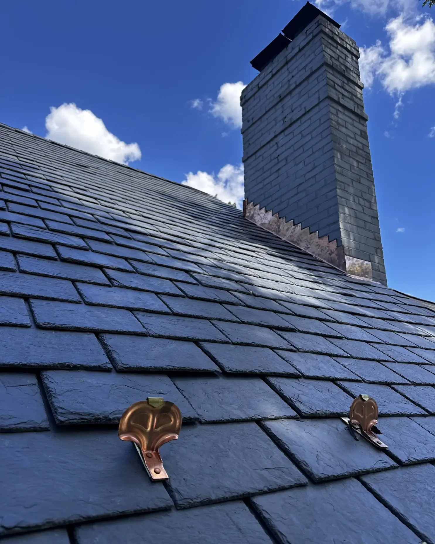 A finished installation of  slate roof snowguard by DA'Roofers in Montgomery County 