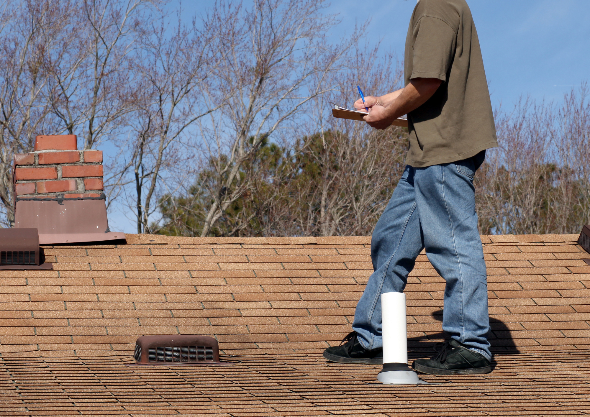 Top-down roof inspection process showing initial rooftop evaluation