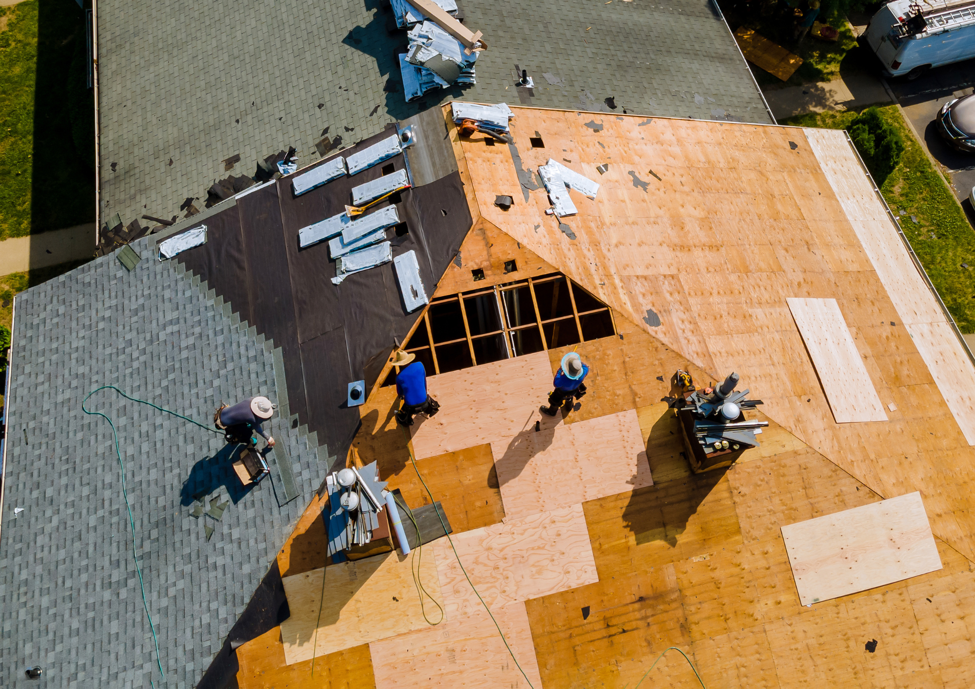 close-up of roof tear-off revealing underlying damage