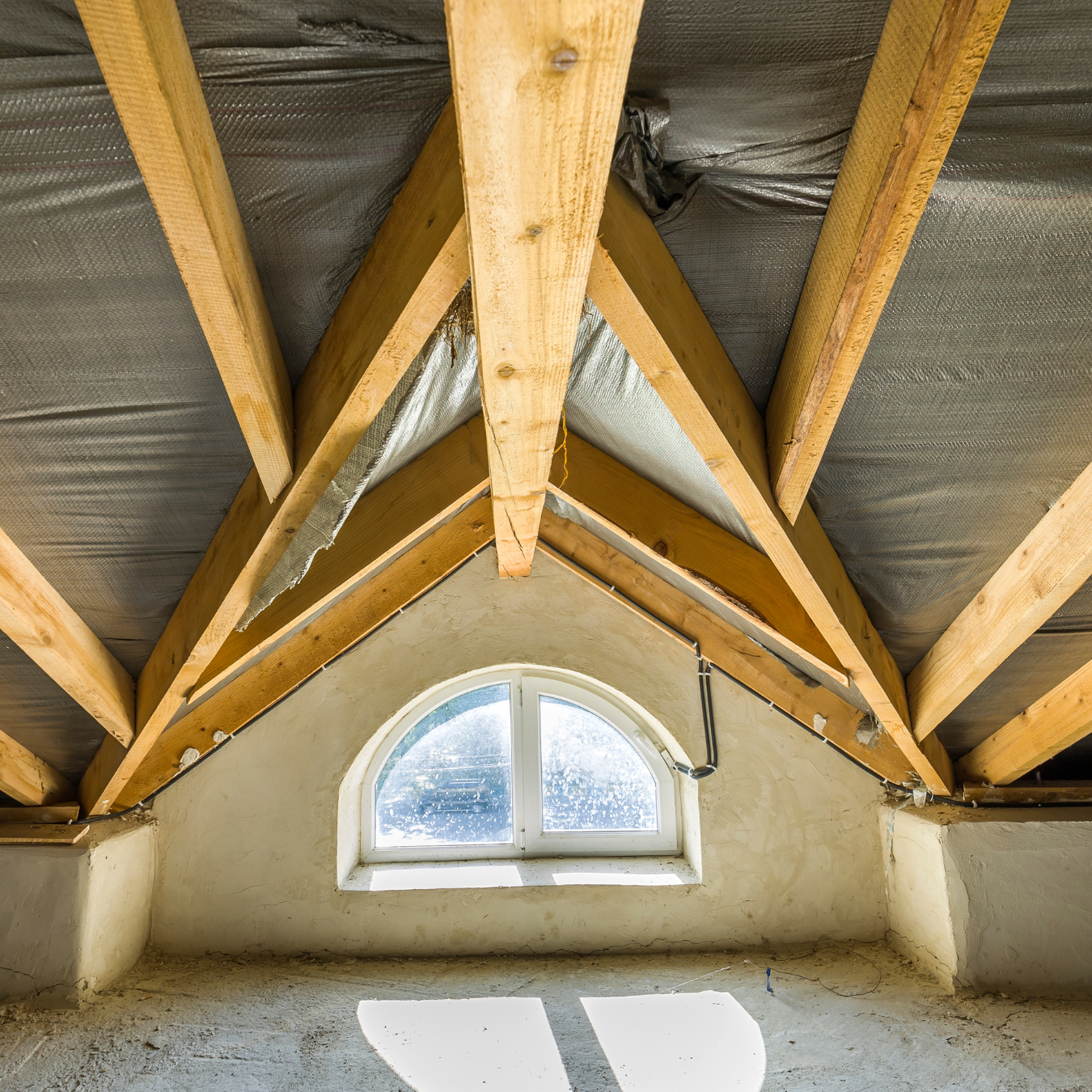 Covering attic to prepare for roof installation