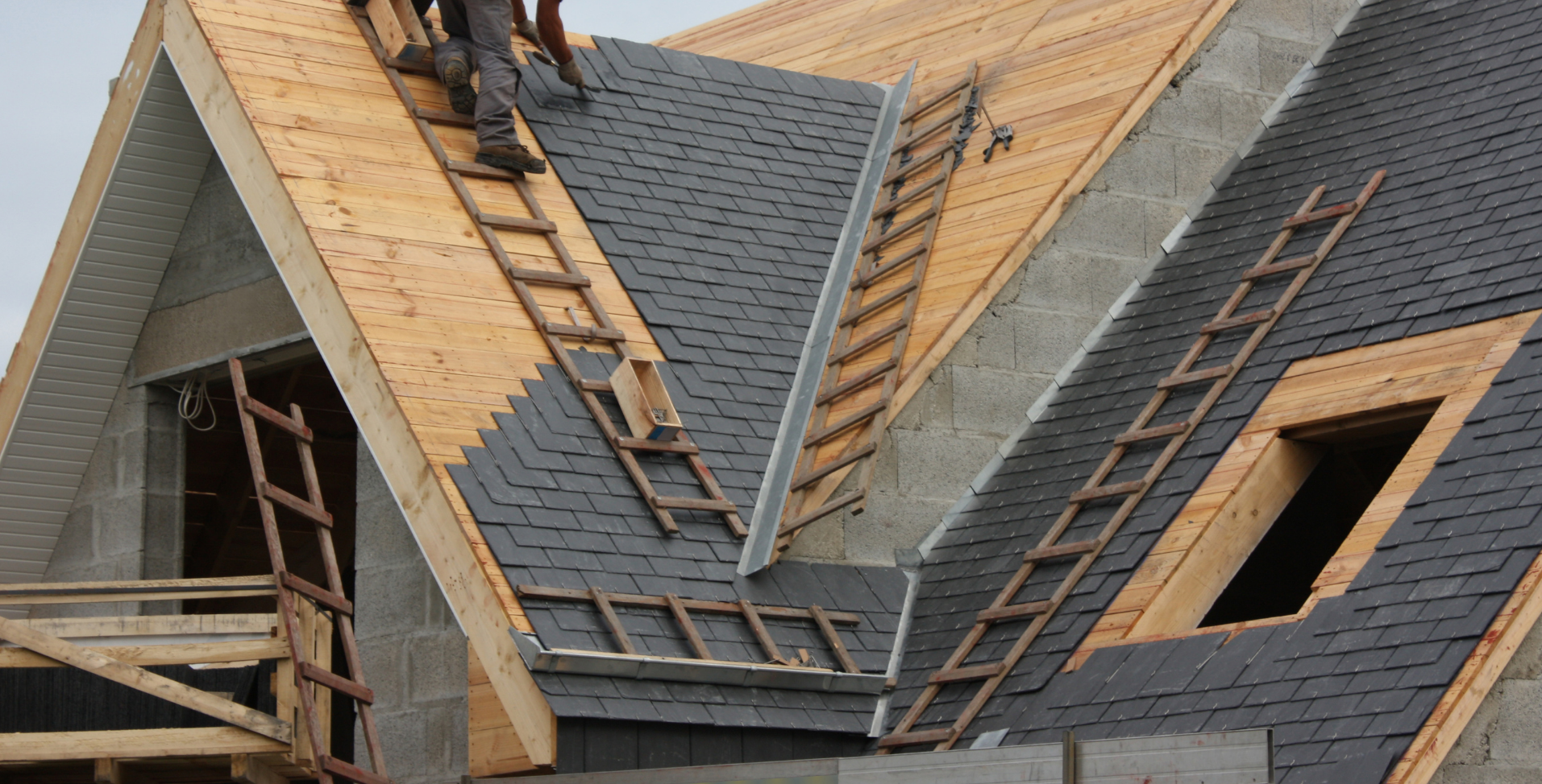 Roofing construction work in progress in the DMV area