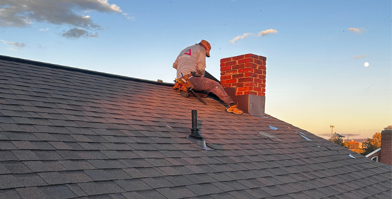 Da' roofers working on a DMV roof project
