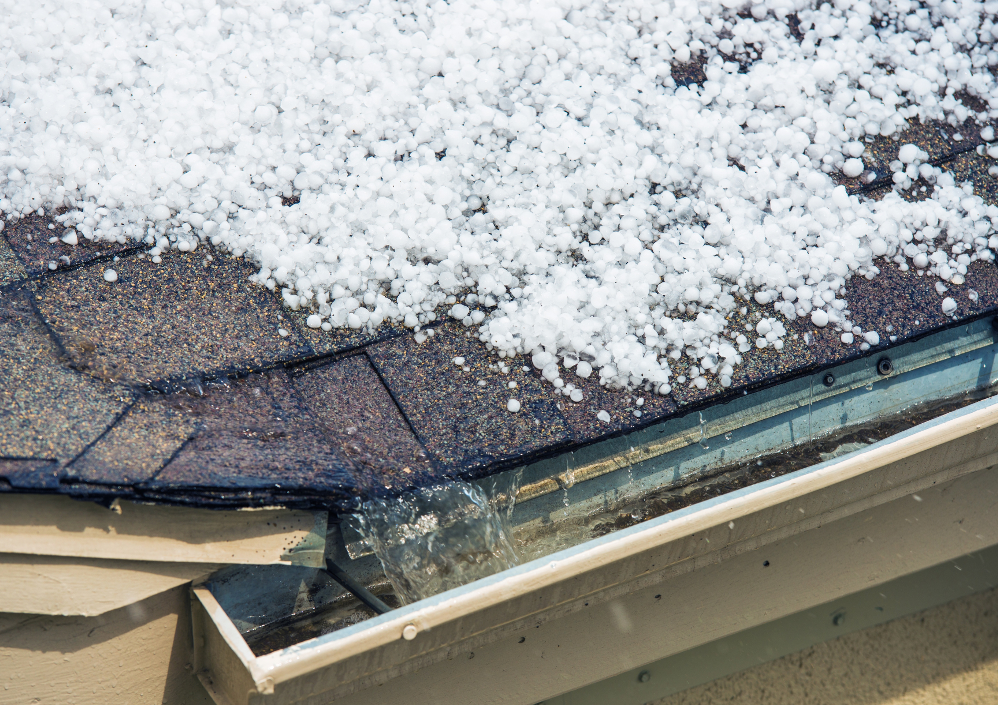 snow-covered roof showing potential winter damage