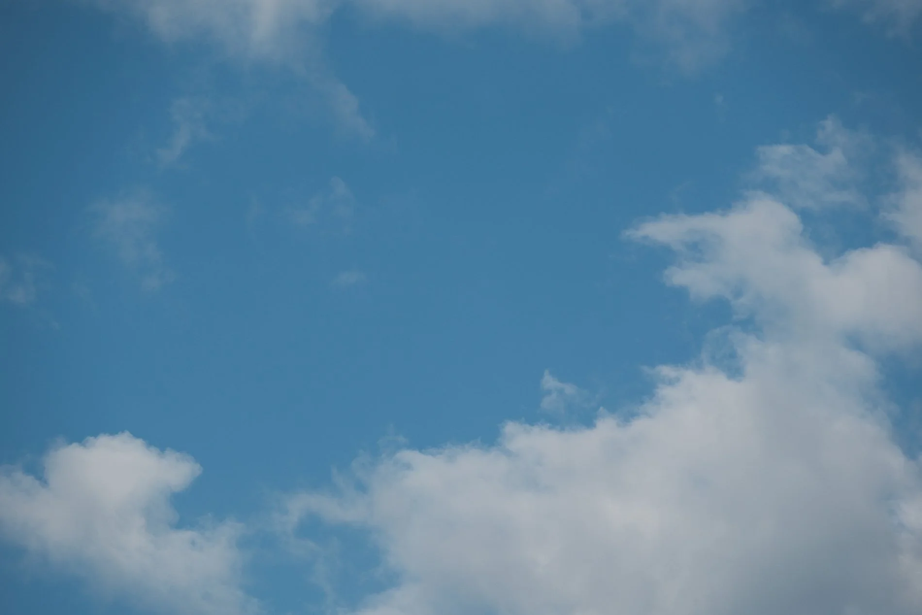 blue sky with wispy clouds