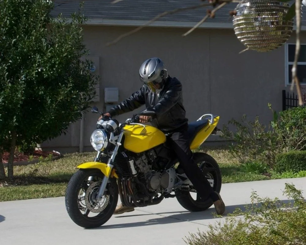 Zahir on one of his motorcycles