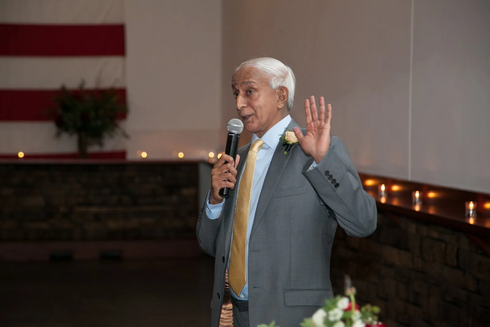 Zahir giving a toast at Leila's wedding, 2015