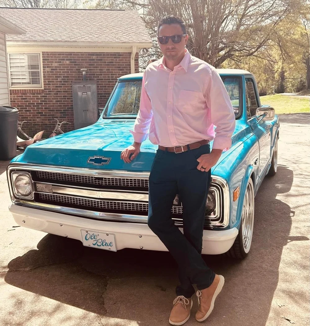 Family gathered with the restored Ole Blue