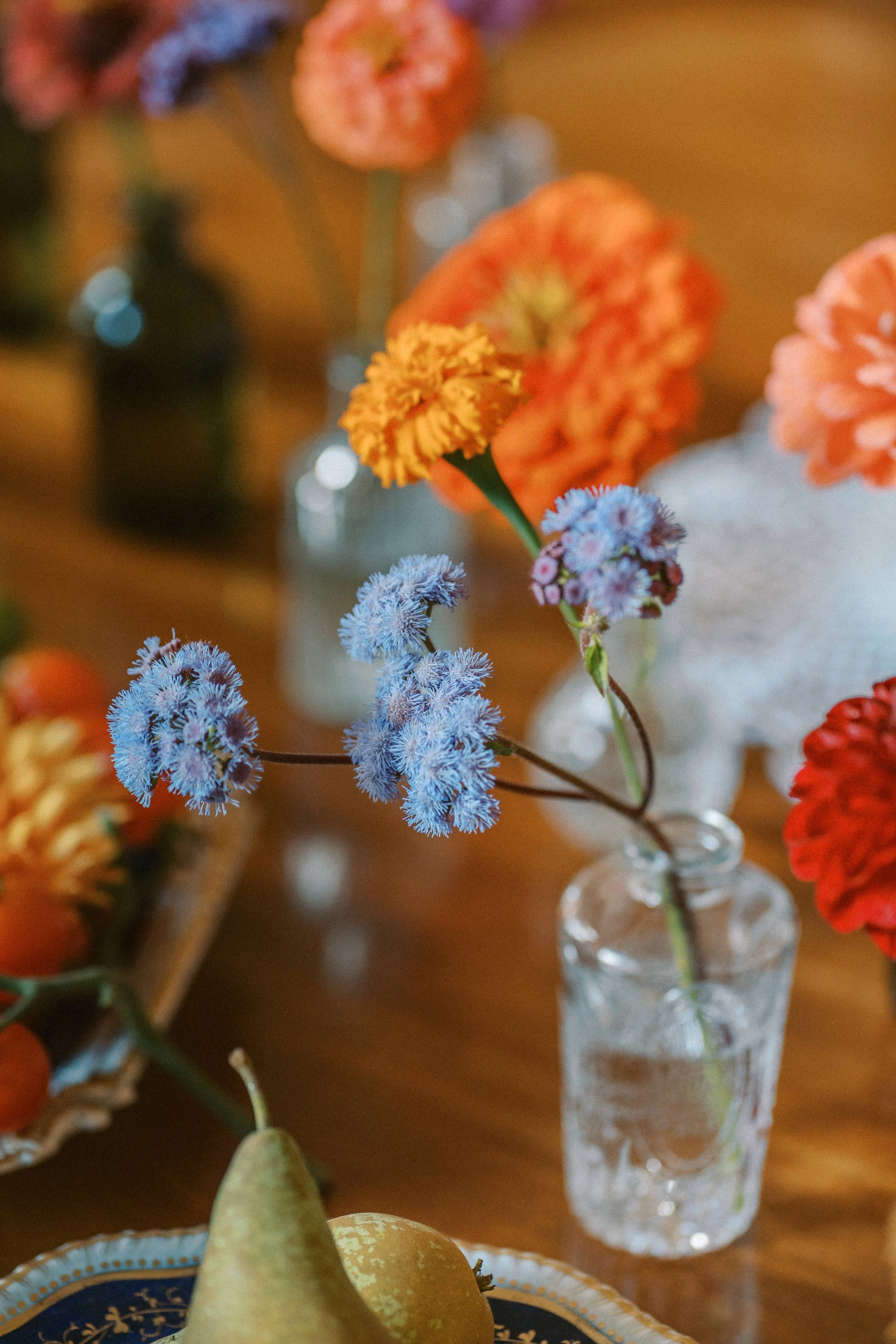 Small bud vase cluster with seasonal Irish flowers for intimate Waterford wedding tables.