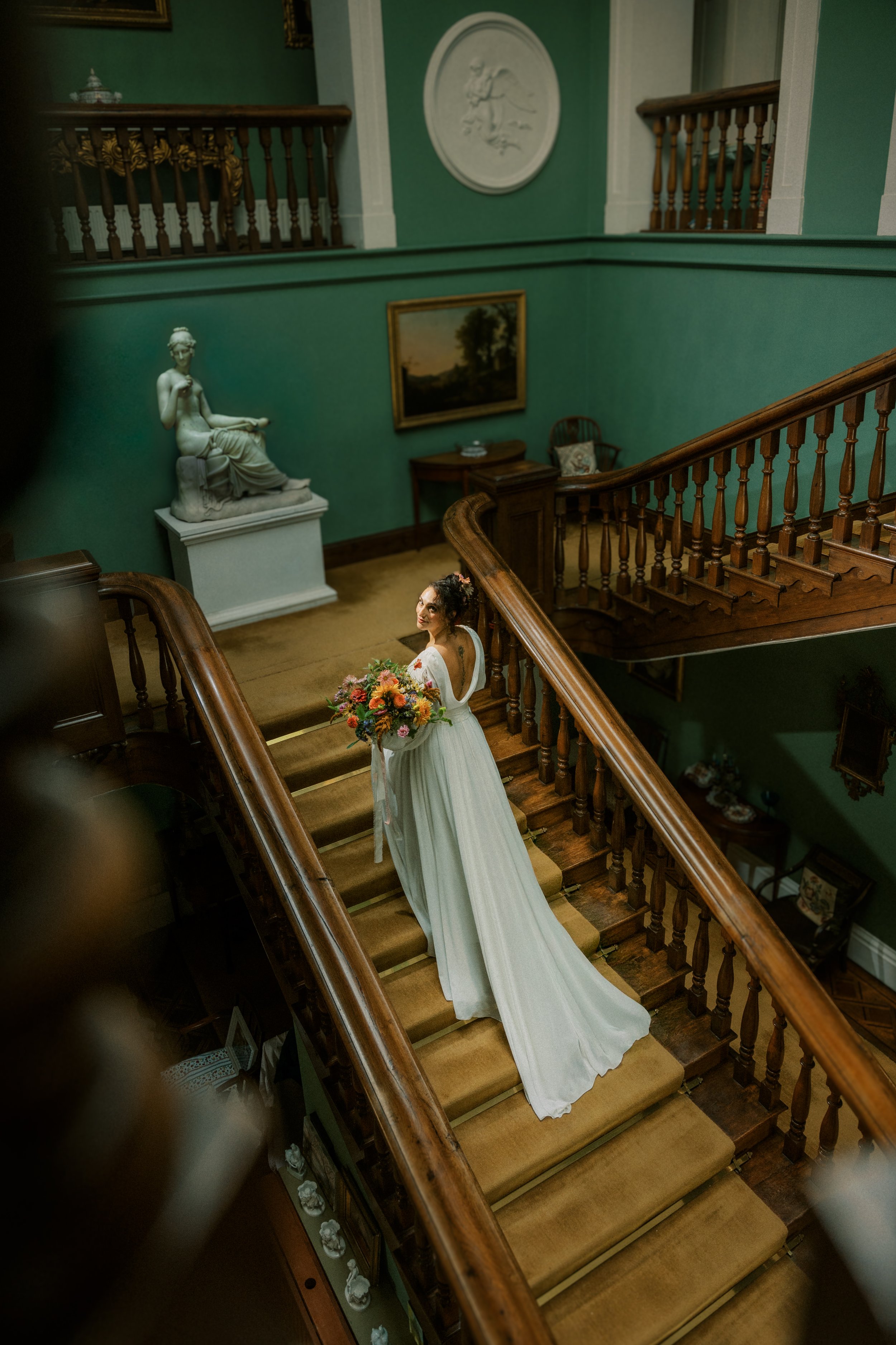 Romantic staircase installation by Moneygorm Farm using wild Irish blooms for a Cork City wedding