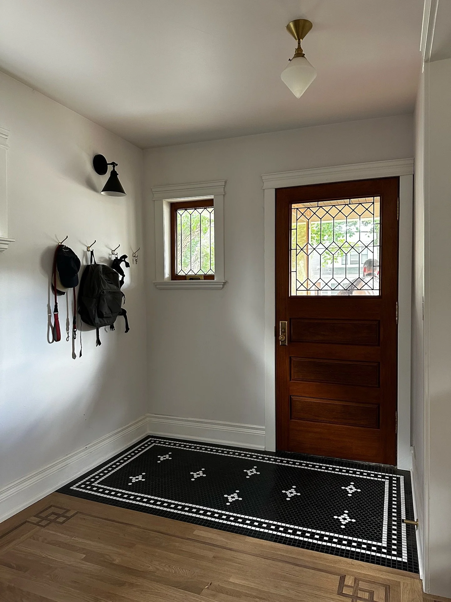 We were lucky enough to have a client that wasn&rsquo;t afraid to go bold for her entry way!
We were able to lean into it and do something really fun while paying homage to the homes heritage with these hexagon and square mosaics.

I&rsquo;m starting