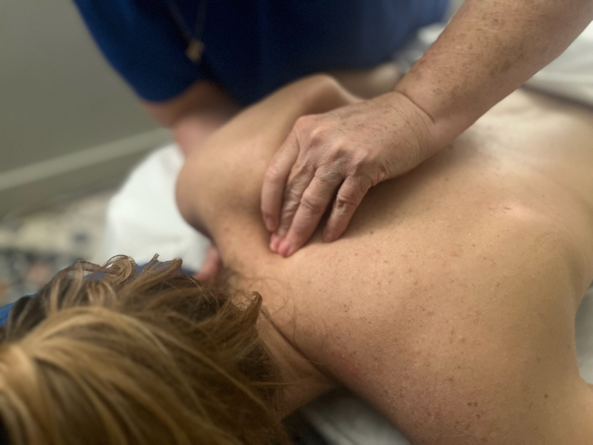 Focused trigger point and muscle therapy during medical massage in Lake Charles