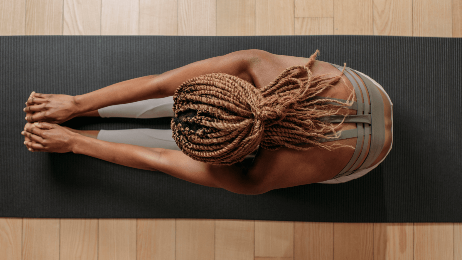 Postnatal Pilates-based core rehabilitation group class led by a physiotherapist