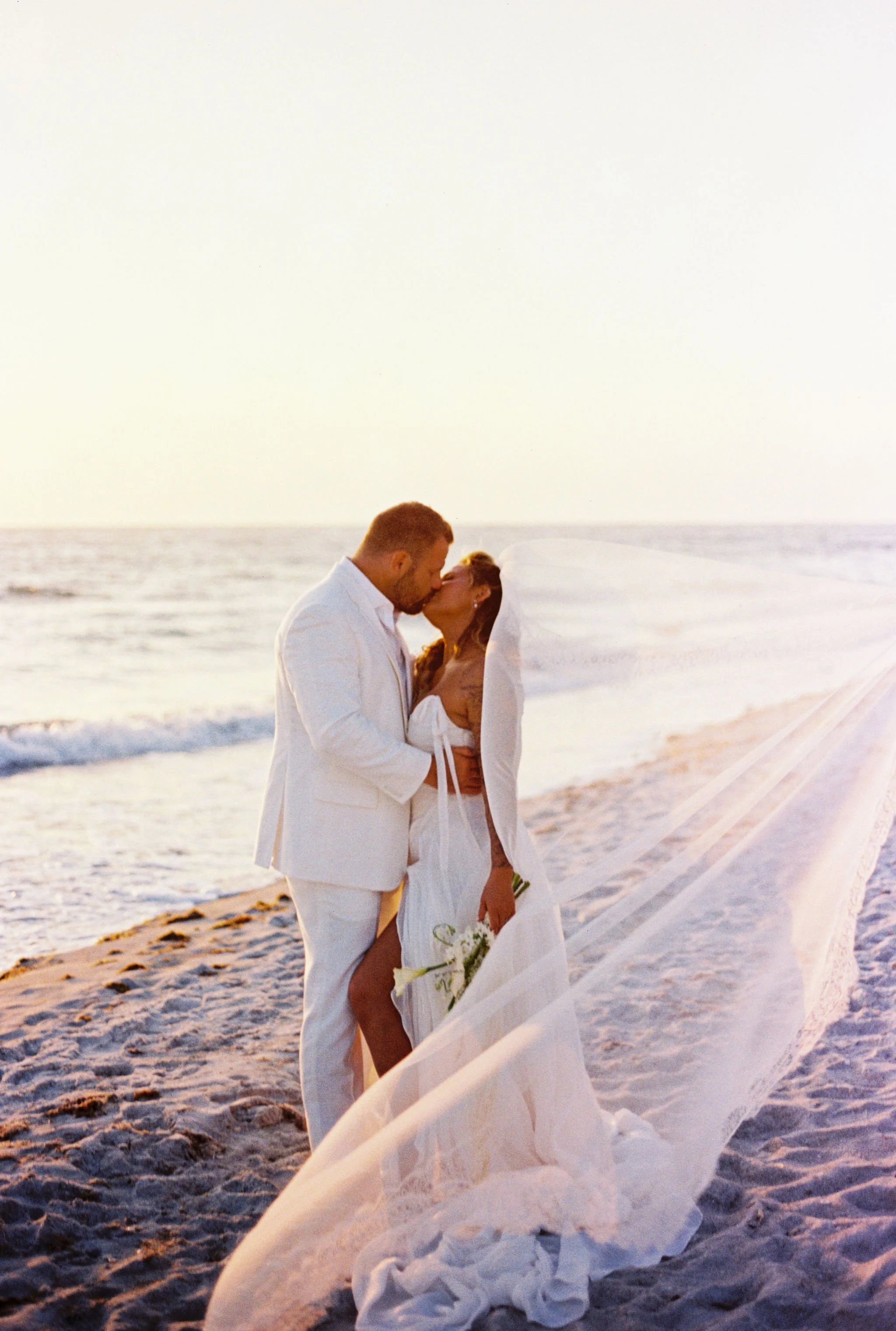 HannahandJoeBooher-StRegisLongboatKey-DivineDesignPhotography12.JPG