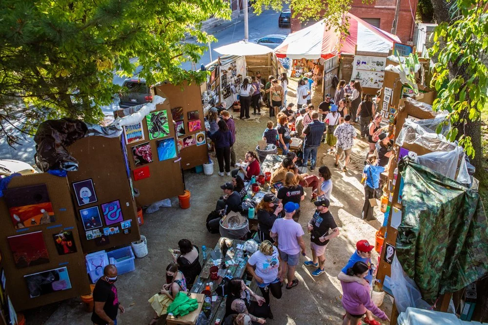Crowd browsing local artist booths at the Louisville UnFair festival