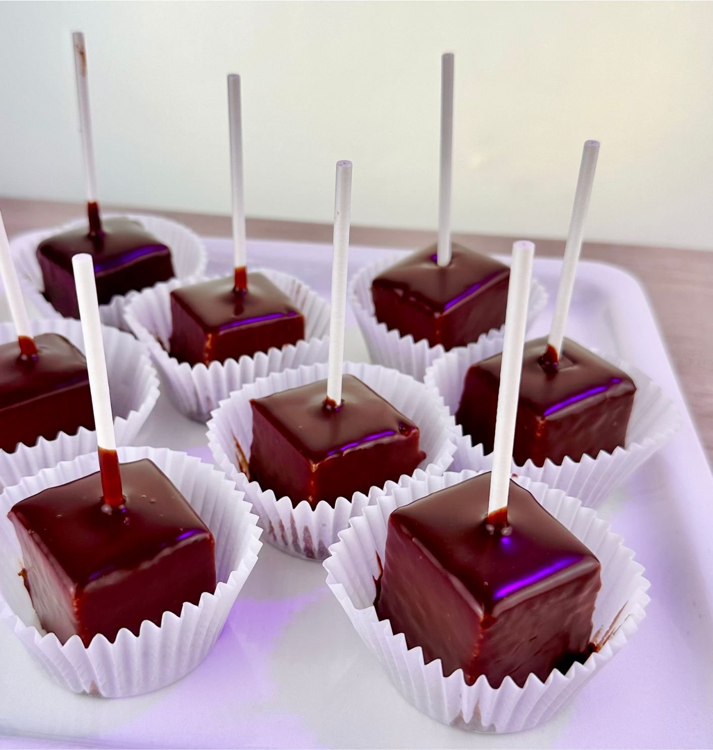 cheesecake cubes dipped in chocolate.jpg