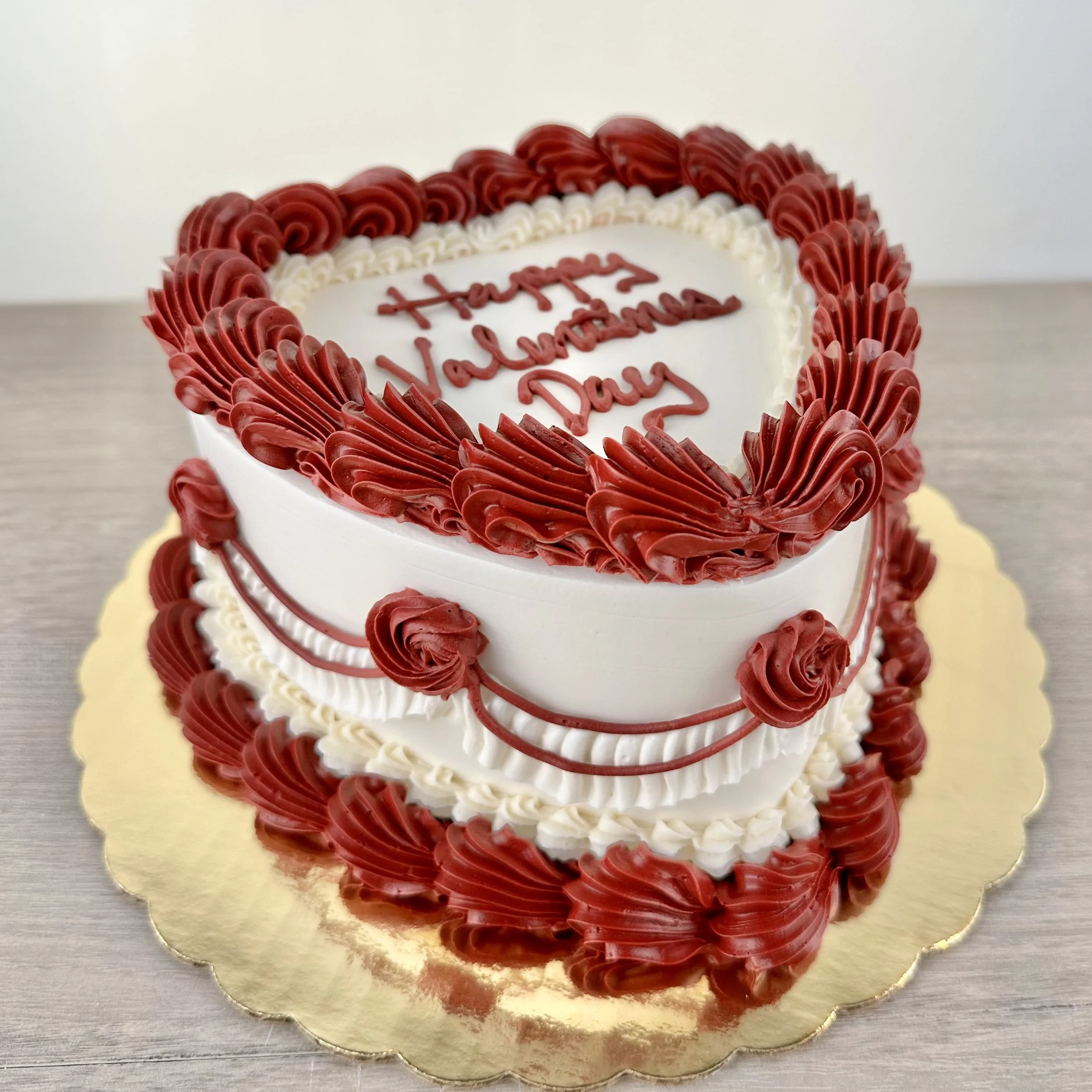 Red and white swag cake