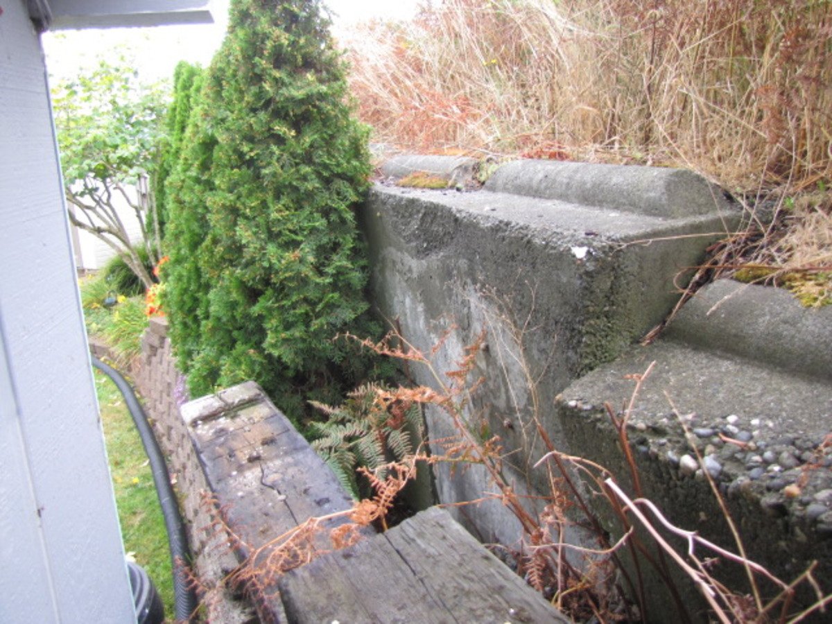 Collapsing retaining wall