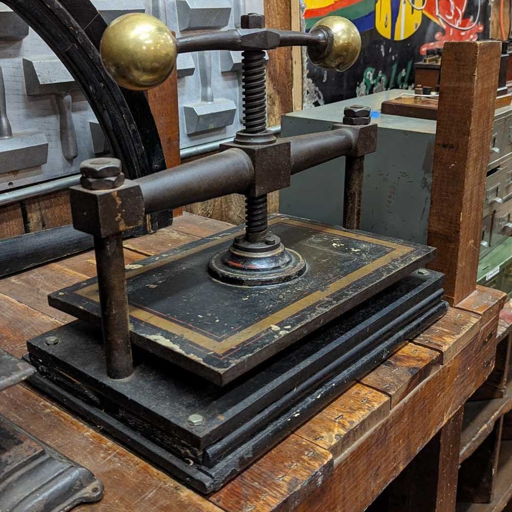 Brass Ball Book Press - need dims - Aurora Mills
