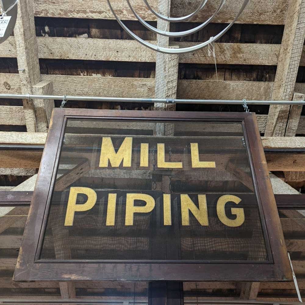 Mill Piping Screen Sign - Aurora Mills