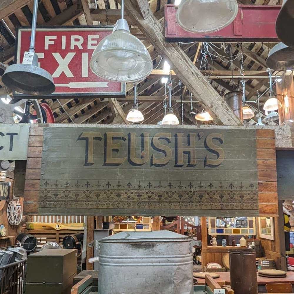 Teush’s Wood Canvas Sign