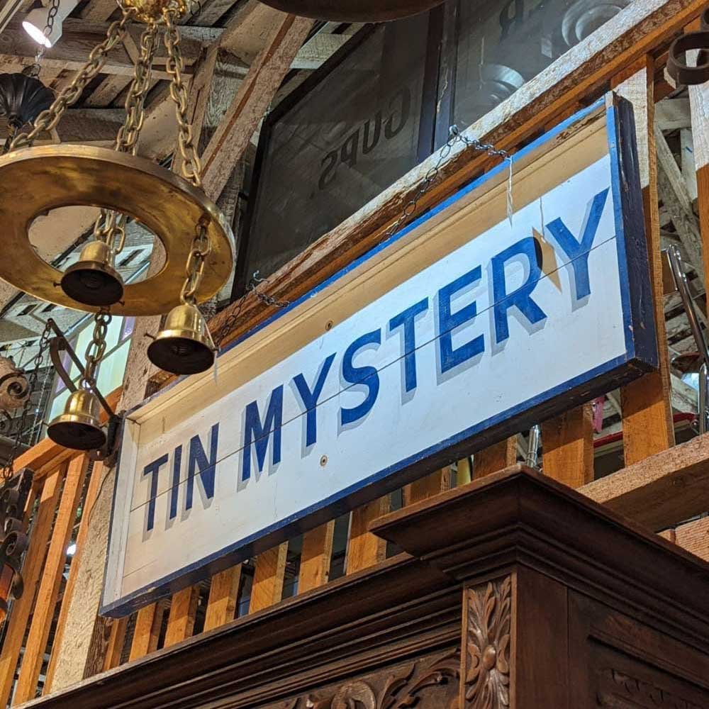 Tin Mystery Sign