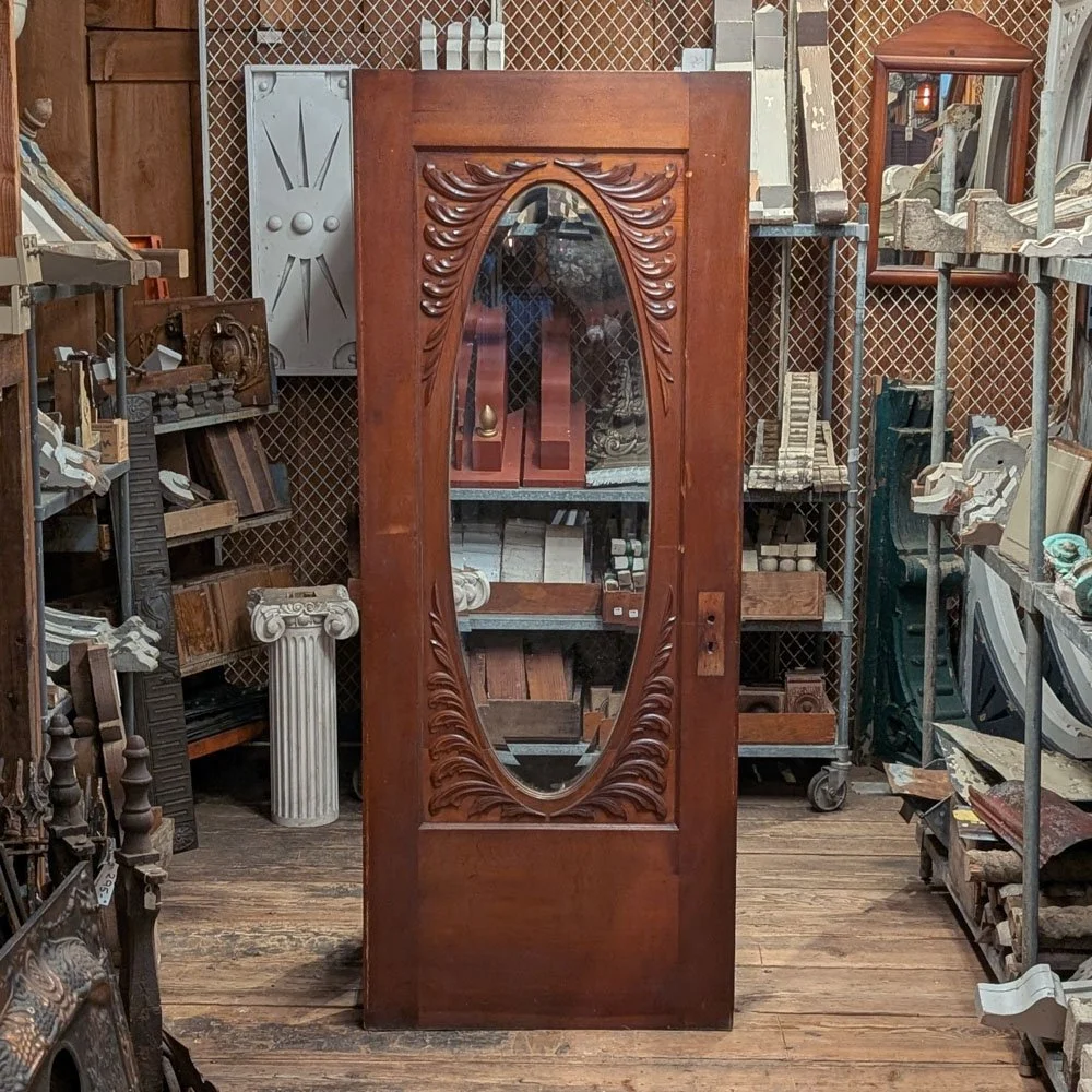 Oval Lite Door with Carved Accents