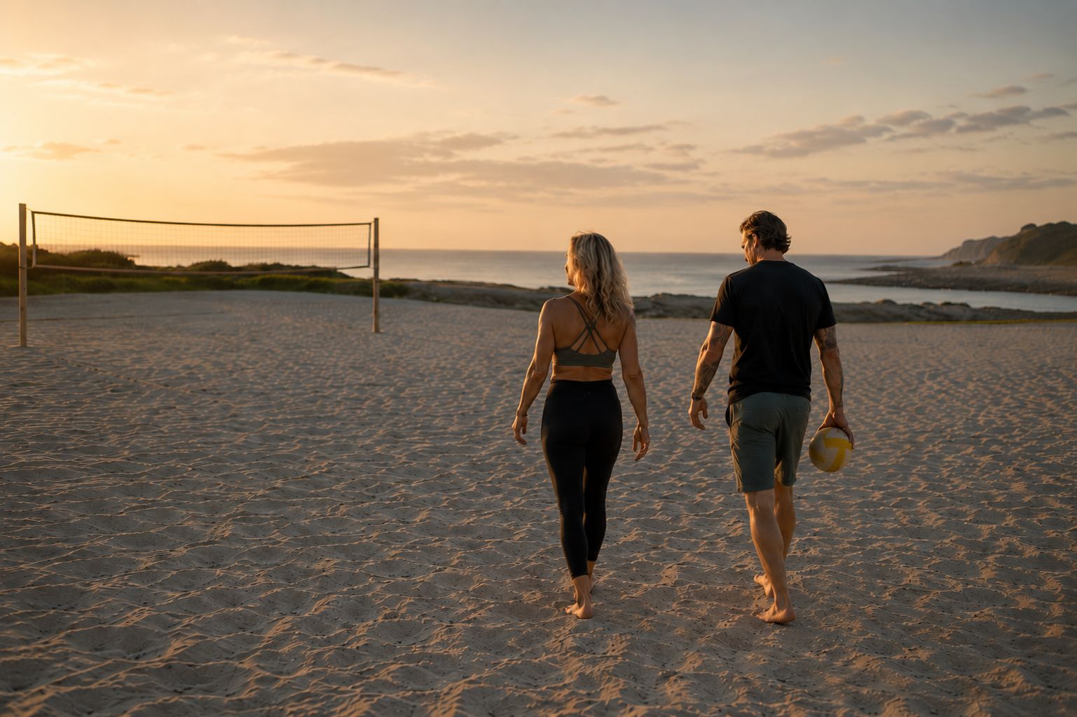 Couple walking together with space between them after playing volleyball, illustrating emotional differentiation in a relationship.