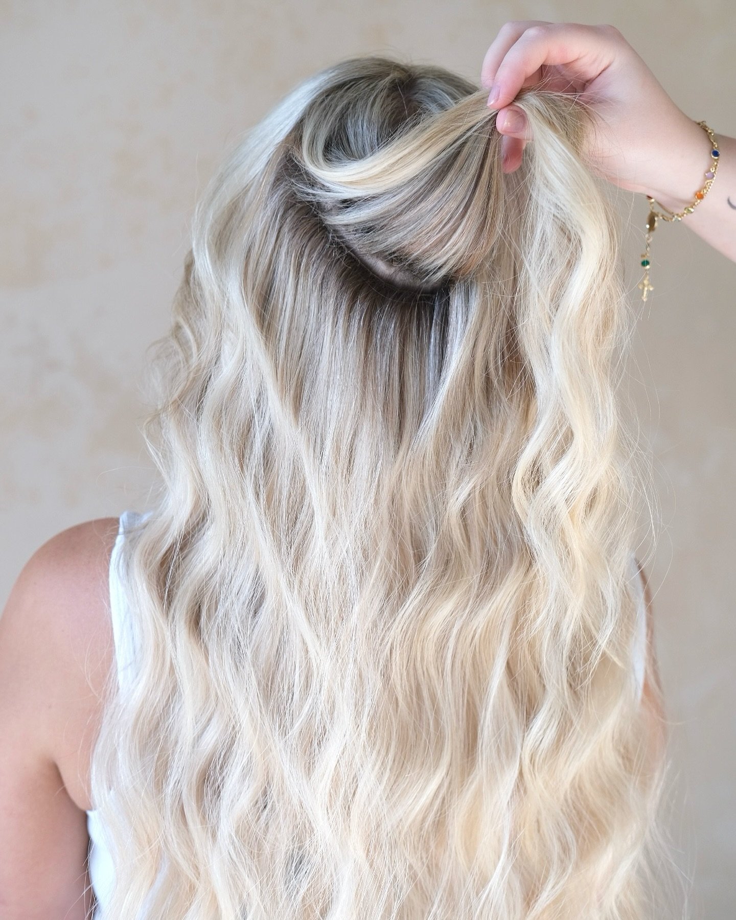 Want extensions that just look like your hair, but better? This is what you get when you come to a specialist. 
There is such attention to detail needed when getting something like extensions, you should see someone who specializes in them and that i