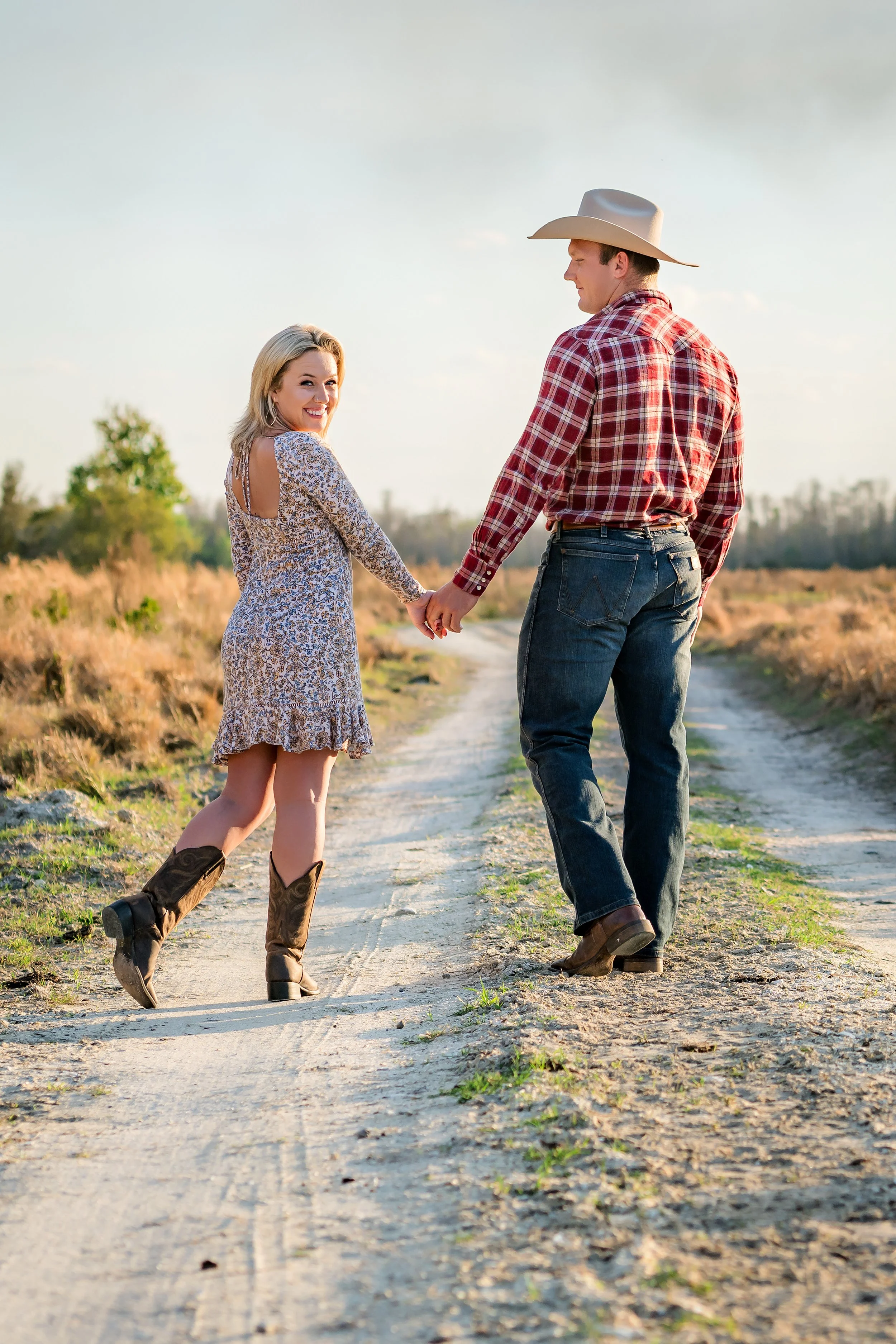 Engagement couple walking at their ranch in St. Cloud, Florida, engagement photography