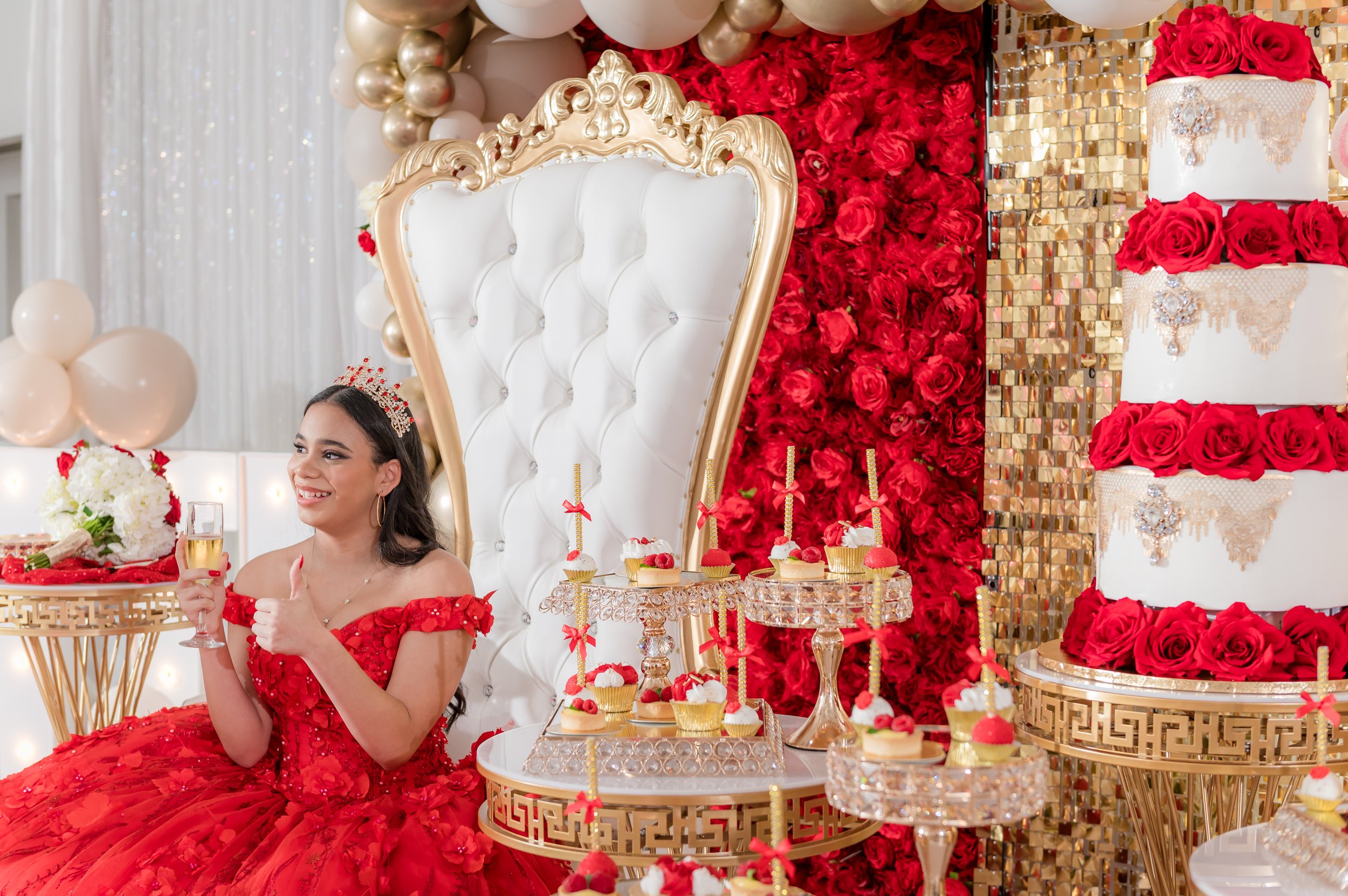 red and gold birthday decor and cake
