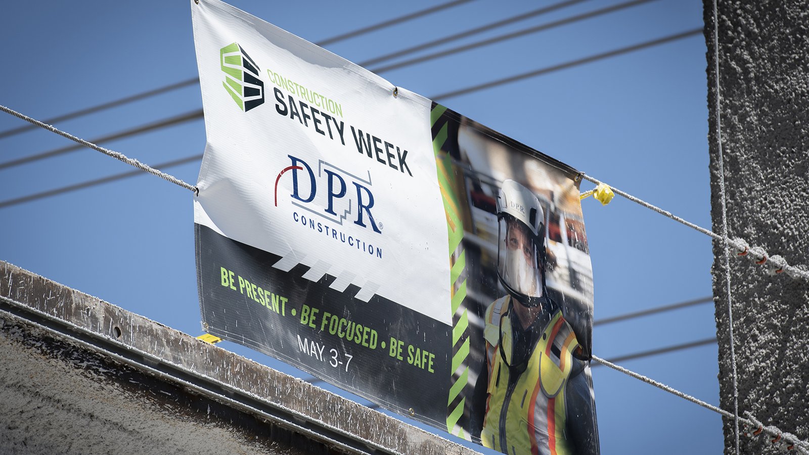 Construction Safety Week sign on a jobsite with the DPR logo.